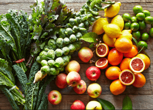 a group of fruits and vegetables on a wood surface Healthy Weight Loss Diets Wrexham